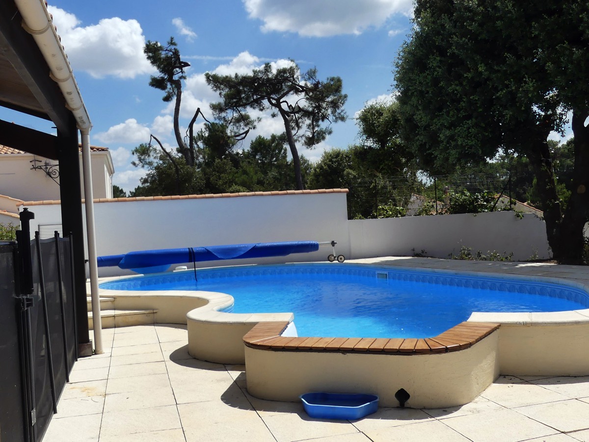 Cool off with a dip in the pool at Villa Les Pins du Phare